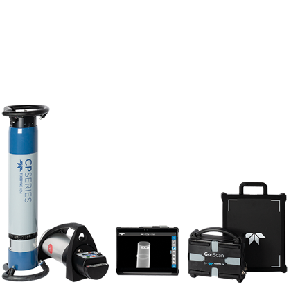 A blue and white tube head stood next to a black and white projector. These are next to a black tablet and attached to the black Teledyne go-scan unit